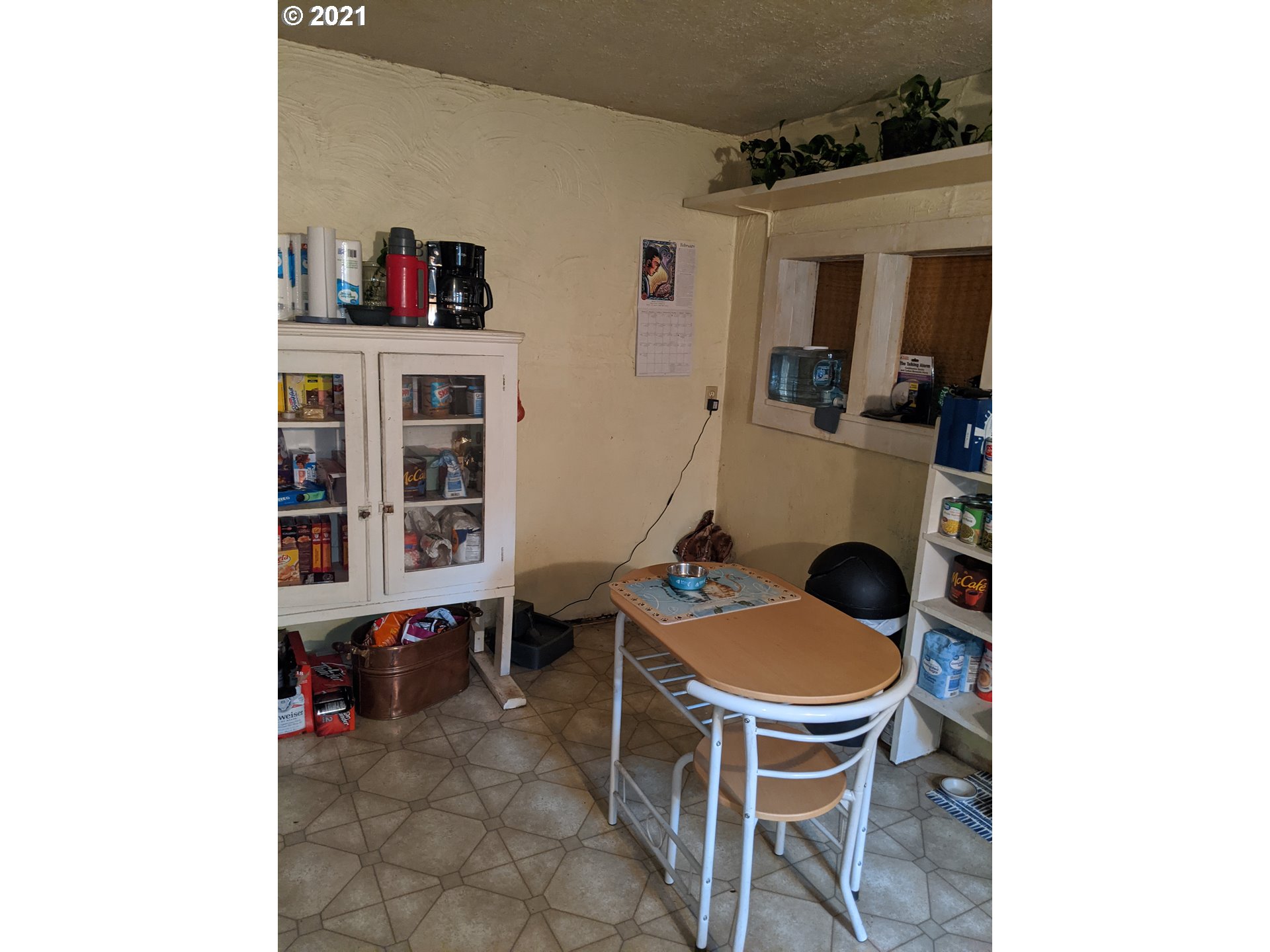 38181 Row River Road Dorena, OR 97434 - Photo 19 of 24 a room with a chair and a table