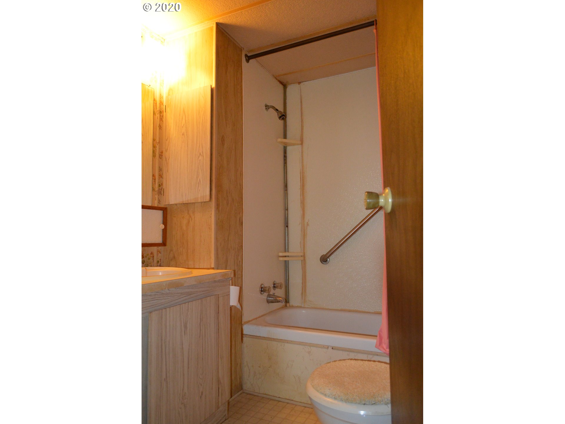 38181 Row River Road Dorena, OR 97434 - Photo 8 of 24 a bathroom with a toilet and a shower