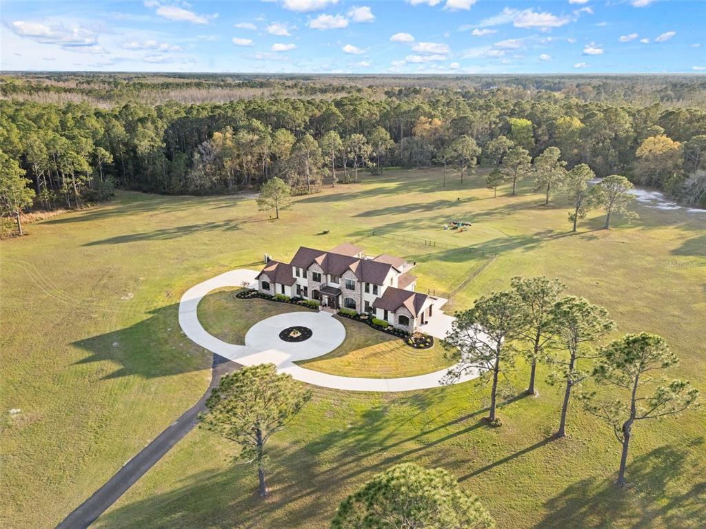 a view of a swimming pool with an ocean view