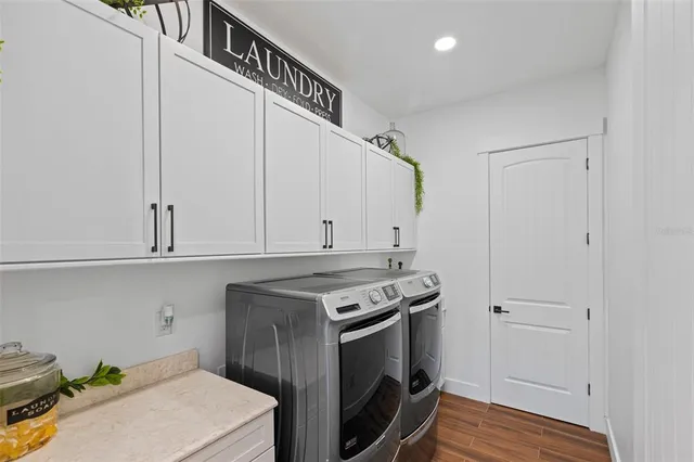 a kitchen with a stove and a microwave