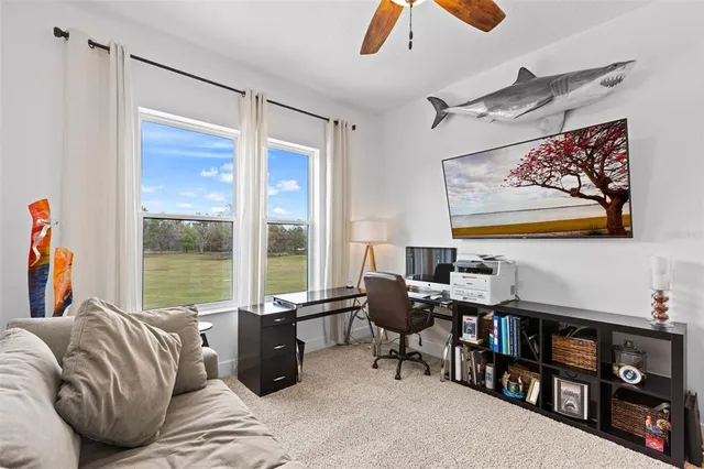 a bedroom with furniture and a window