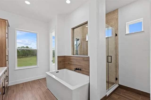 a hallway with a washer and dryer
