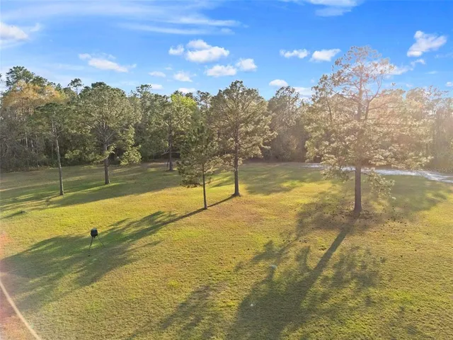 a view of an ocean & house