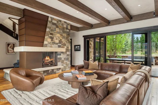 a kitchen with a table and chairs