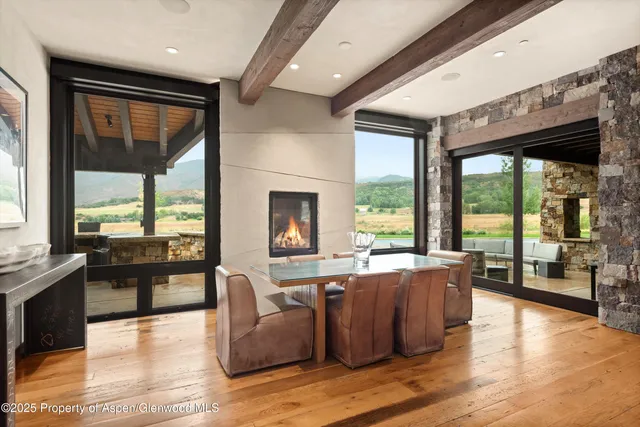 a room with a large bed and a large window