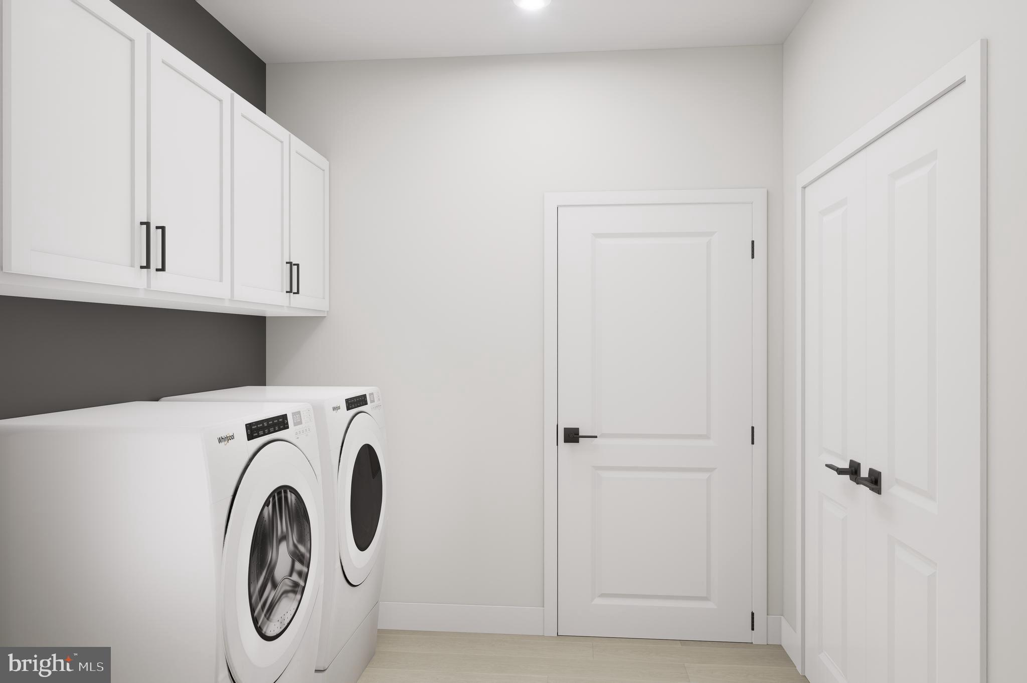 1121 Fortune Terrace, Unit 110 Potomac, MD 20854 - Photo 11 of 12 a utility room with dryer and washer