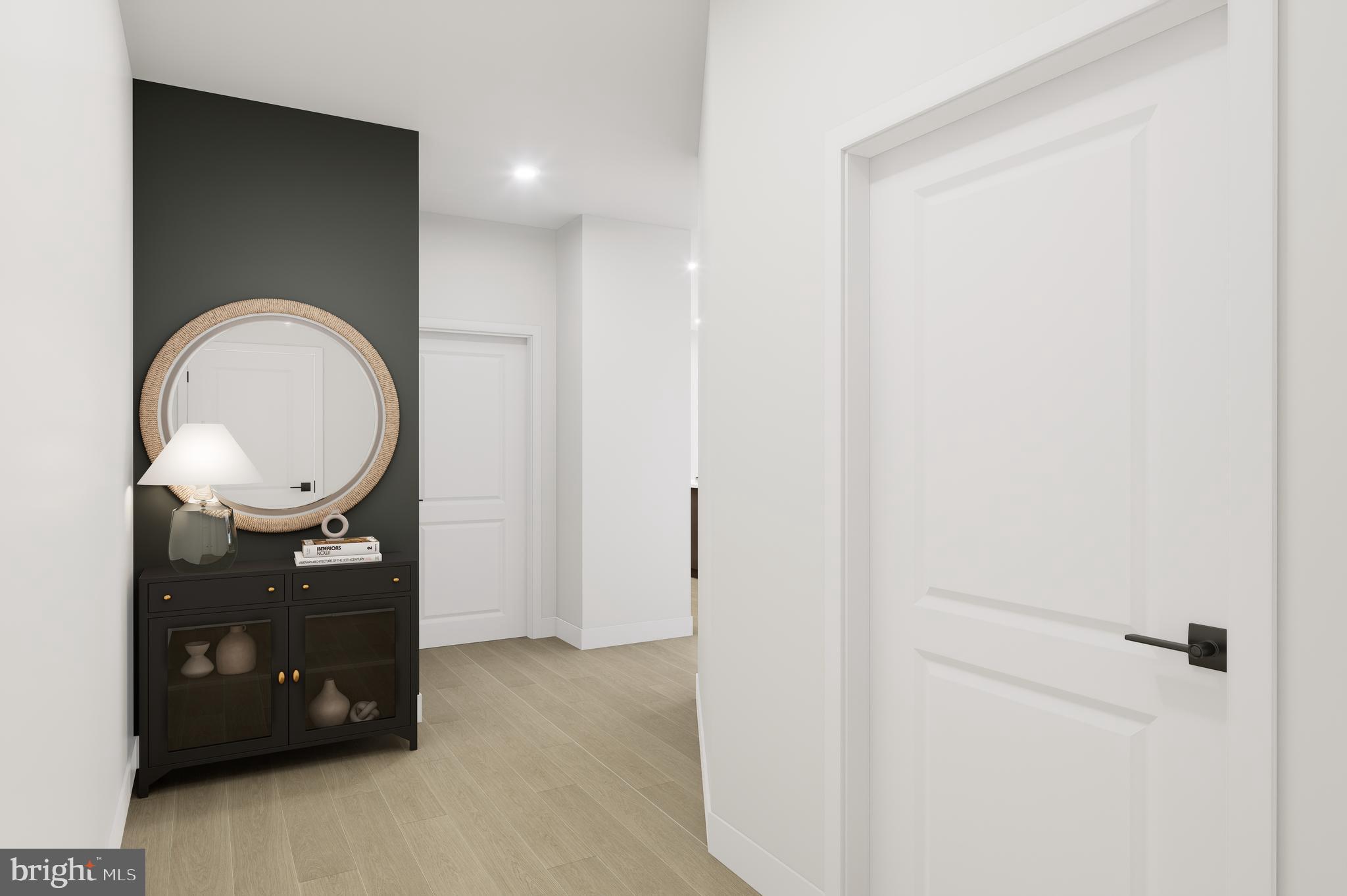 1121 Fortune Terrace, Unit 110 Potomac, MD 20854 - Photo 2 of 12 a living room with a mirror