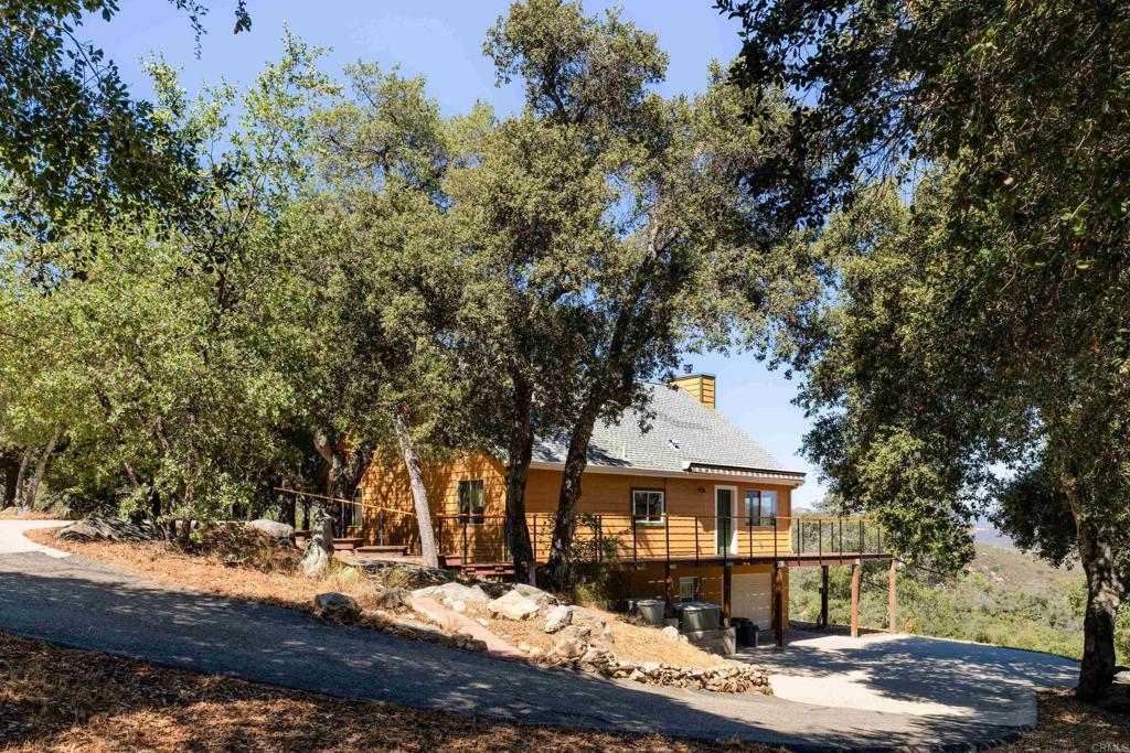 25770 East Grade Road Santa Ysabel, CA 92070 - Photo 43 of 75 a front view of a house with a tree