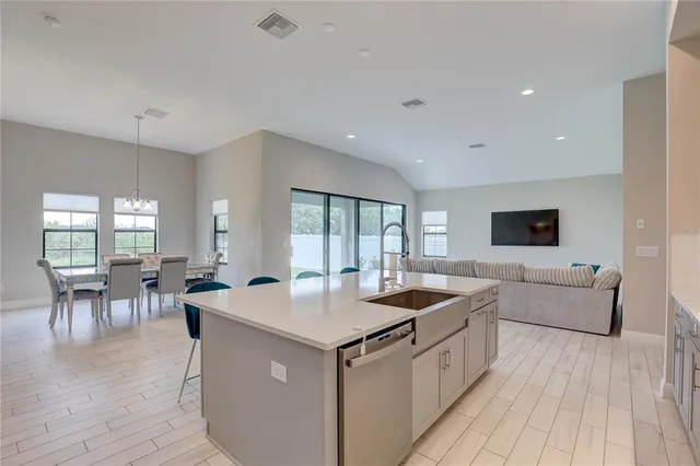 a bedroom with a bed and cabinets