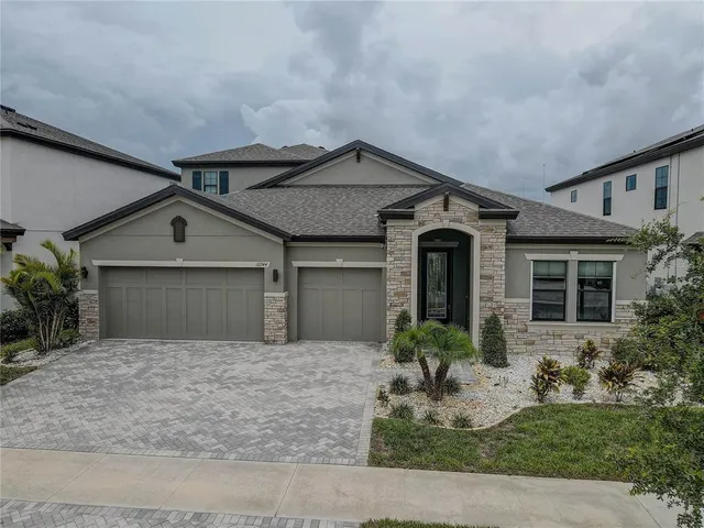 front view of a house with yard