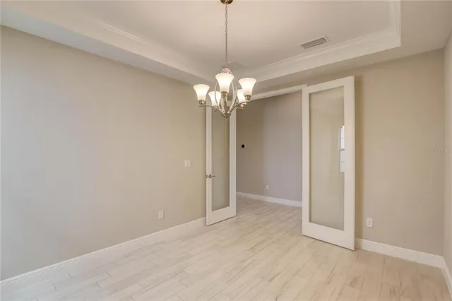 a view of a house with a yard porch and sitting area