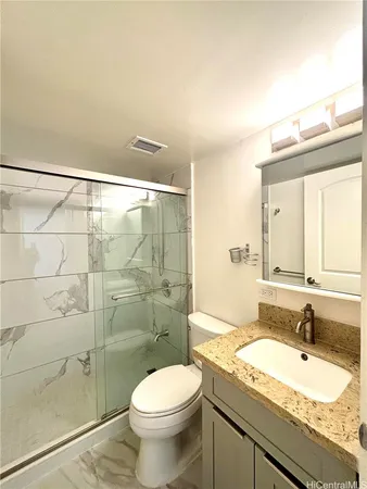 a view of a kitchen with a sink