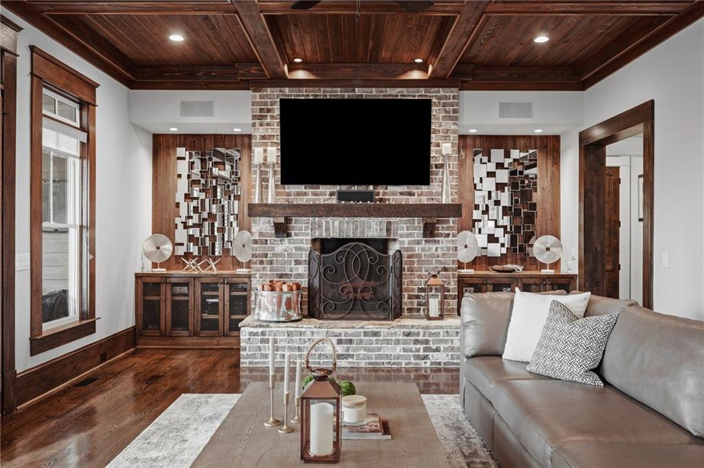 263 Hanson Way Northwest Marietta, GA 30064 - Photo 14 of 84 a living room with furniture a flat screen tv and a fireplace