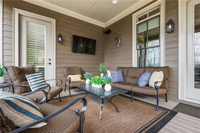 a kitchen with stainless steel appliances a stove a sink and a refrigerator