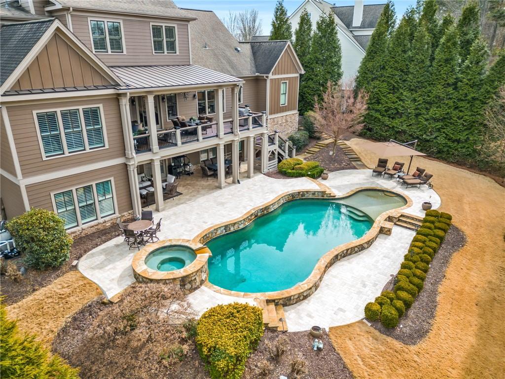 263 Hanson Way Northwest Marietta, GA 30064 - Photo 2 of 84 a view of a house with swimming pool