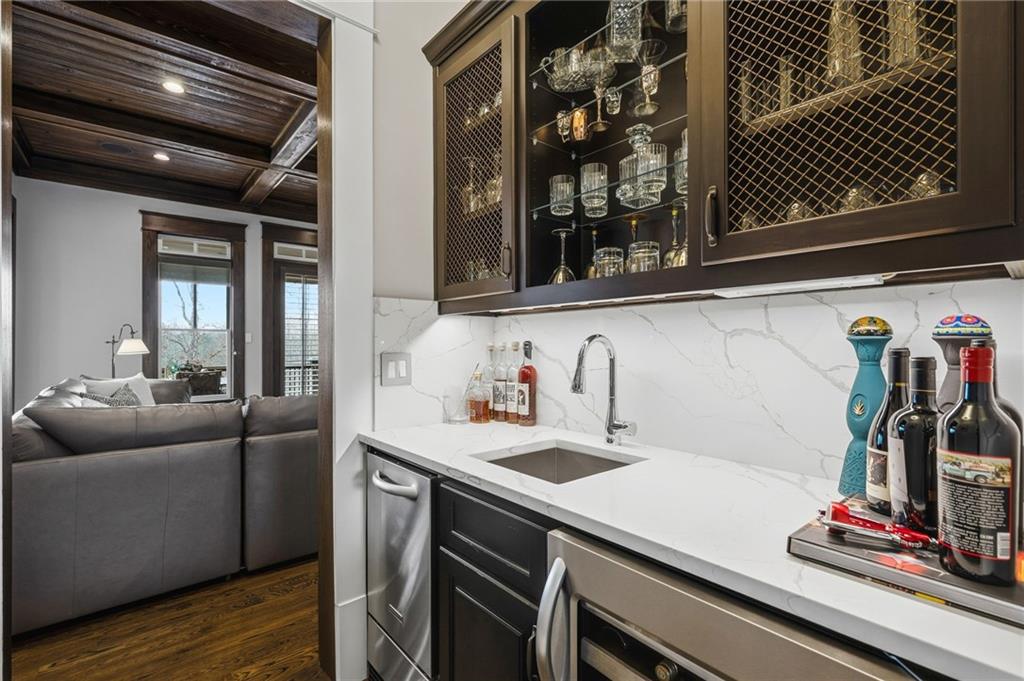 263 Hanson Way Northwest Marietta, GA 30064 - Photo 21 of 84 a kitchen with a sink and wooden floor