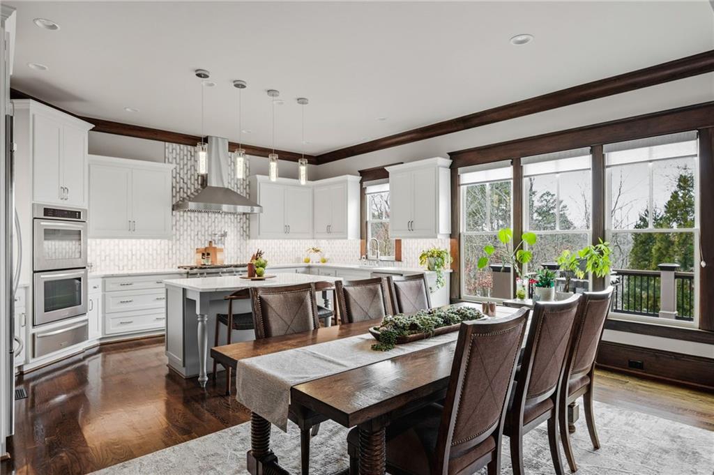 263 Hanson Way Northwest Marietta, GA 30064 - Photo 22 of 84 a view of a dining room with furniture window and outside view