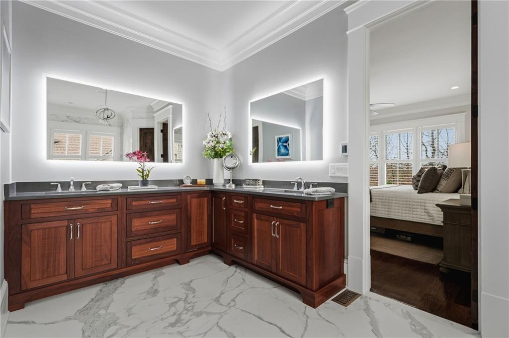 263 Hanson Way Northwest Marietta, GA 30064 - Photo 33 of 84 a spacious bathroom with a granite countertop double vanity sink and a mirror