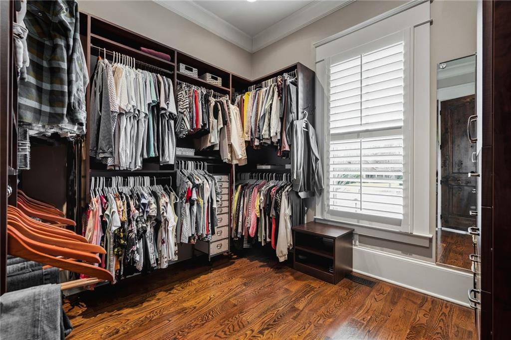 263 Hanson Way Northwest Marietta, GA 30064 - Photo 35 of 84 a view of walk in closet with clothes and shoes