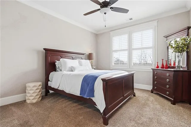 a view of a livingroom with an empty room and fire place