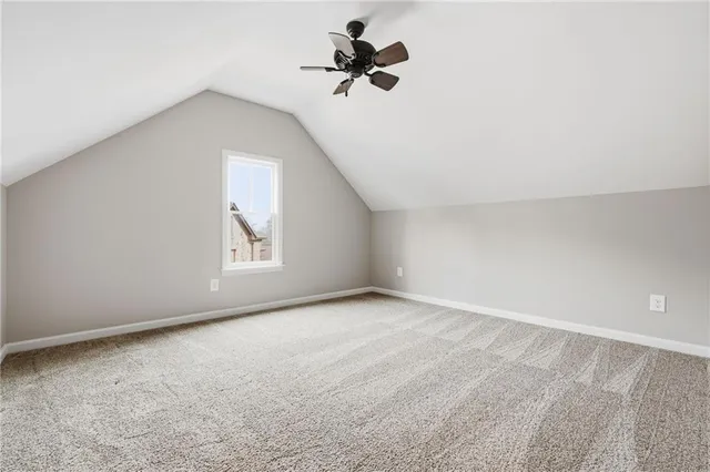 a view of a swimming pool in the backyard