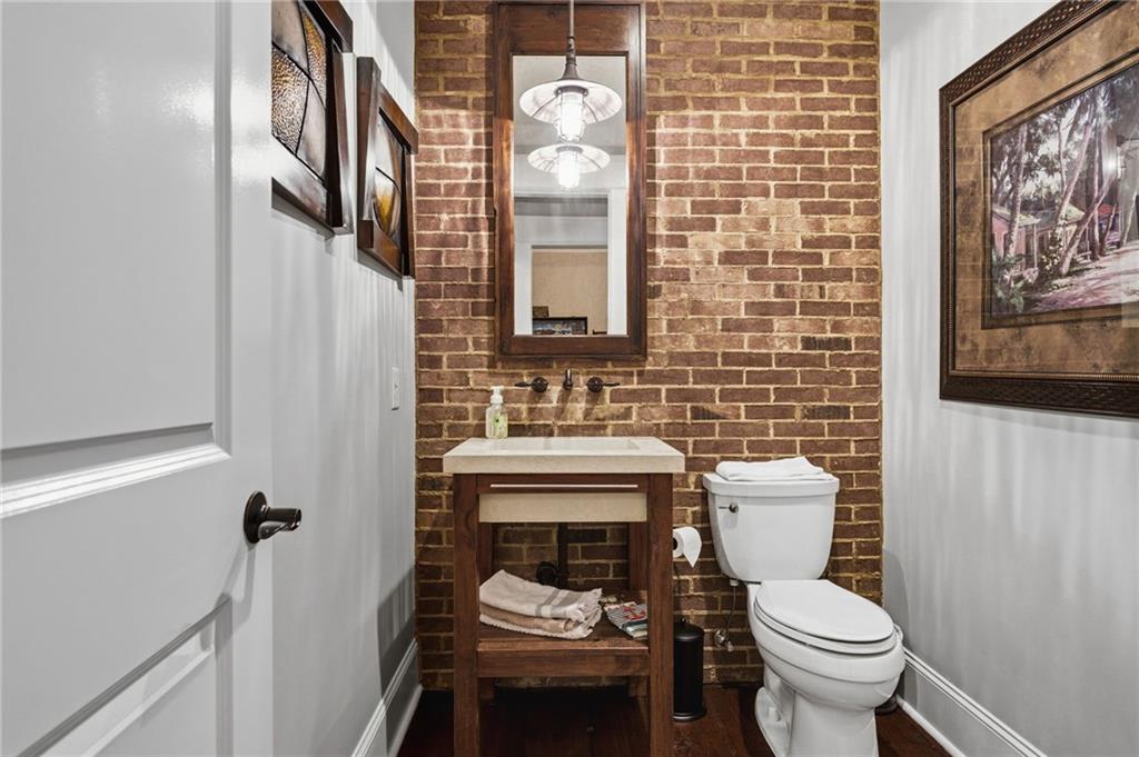 263 Hanson Way Northwest Marietta, GA 30064 - Photo 54 of 84 a bathroom with a toilet sink and mirror