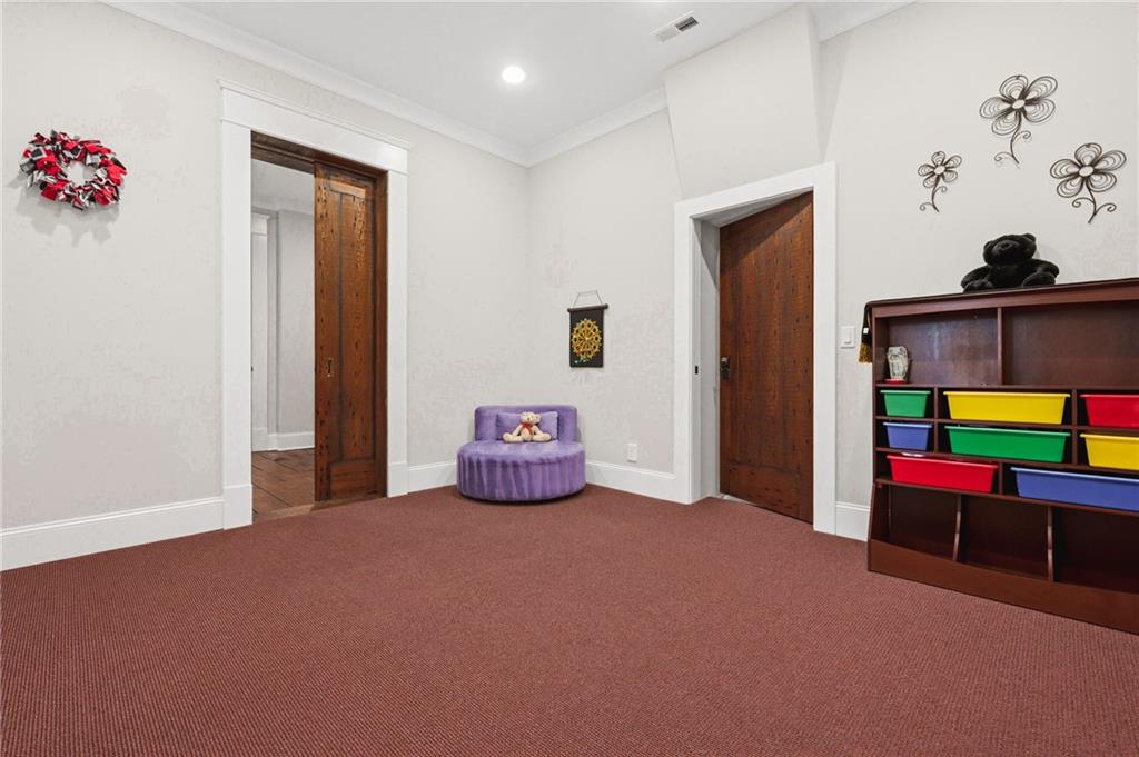 263 Hanson Way Northwest Marietta, GA 30064 - Photo 55 of 84 a living room with furniture and a flat screen tv