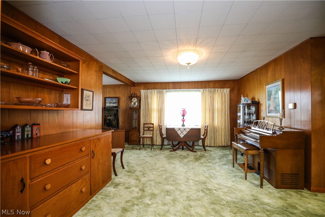 7769 Peck Road Ravenna, OH 44266 - Photo 10 of 50 Carpeted office space with wood walls