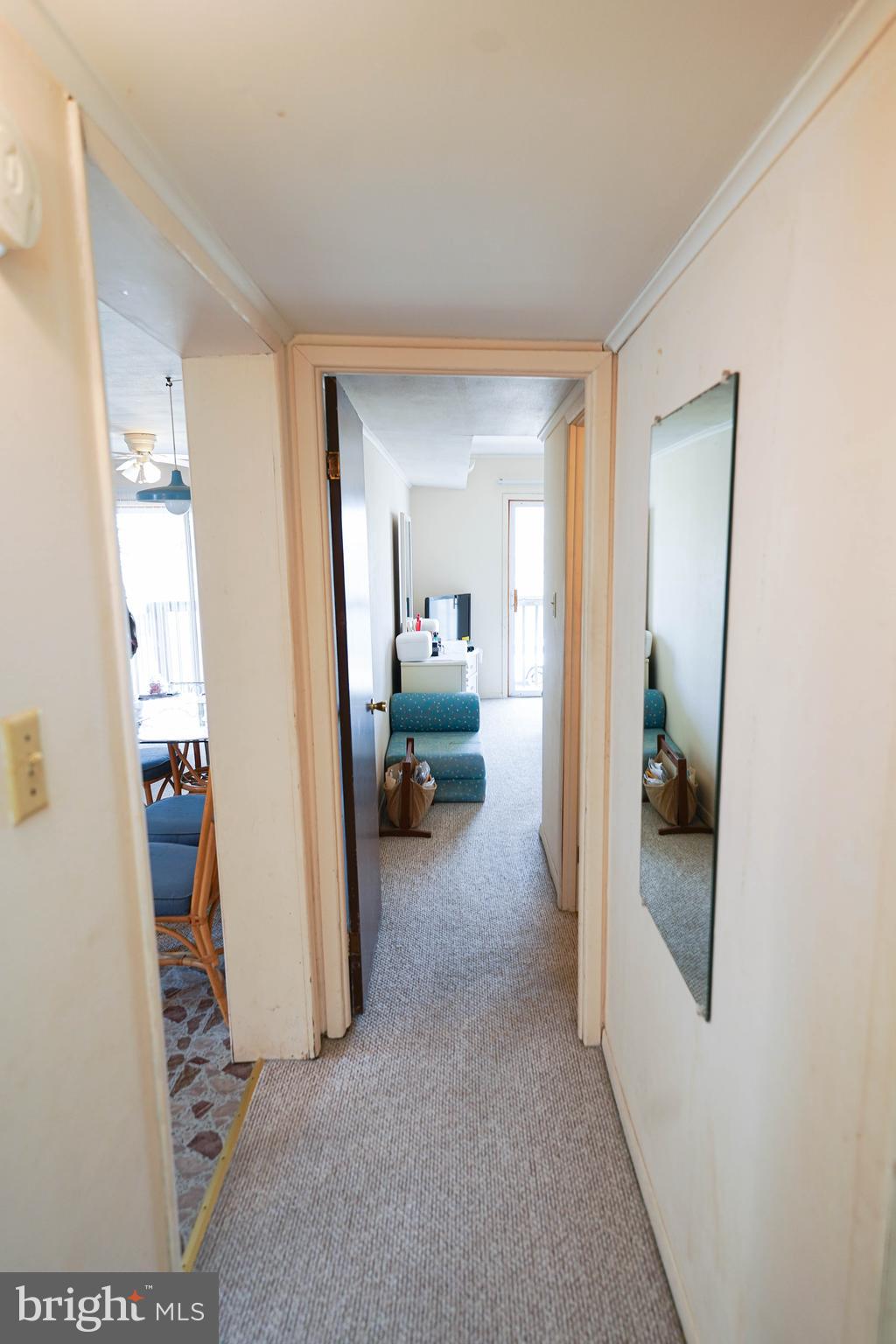 113 Jamestown Road, Unit D1 Ocean City, MD 21842 - Photo 21 of 46 hall toward primary bedroom and bath