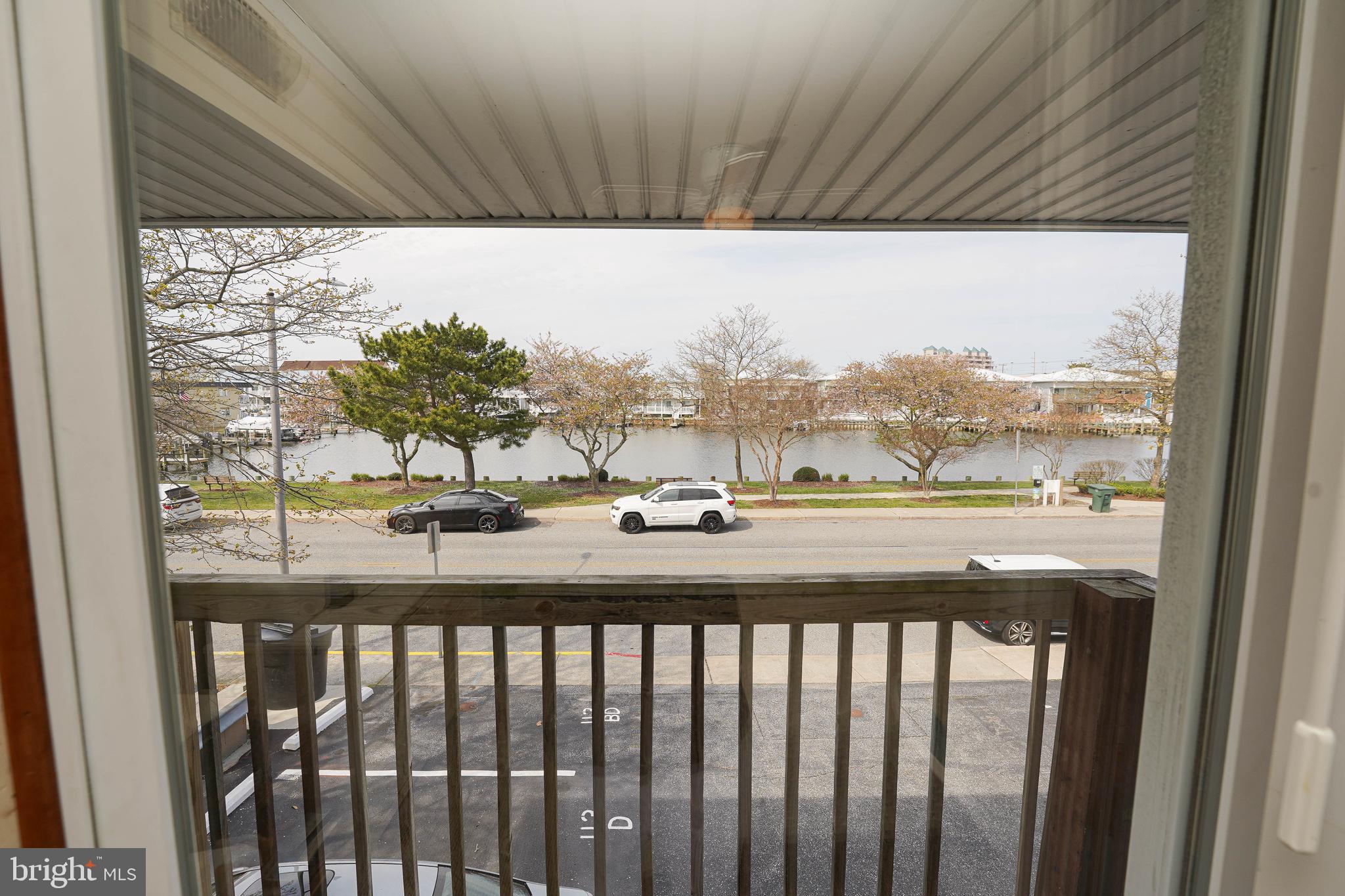 113 Jamestown Road, Unit D1 Ocean City, MD 21842 - Photo 23 of 46 balcony off the primary bedroom