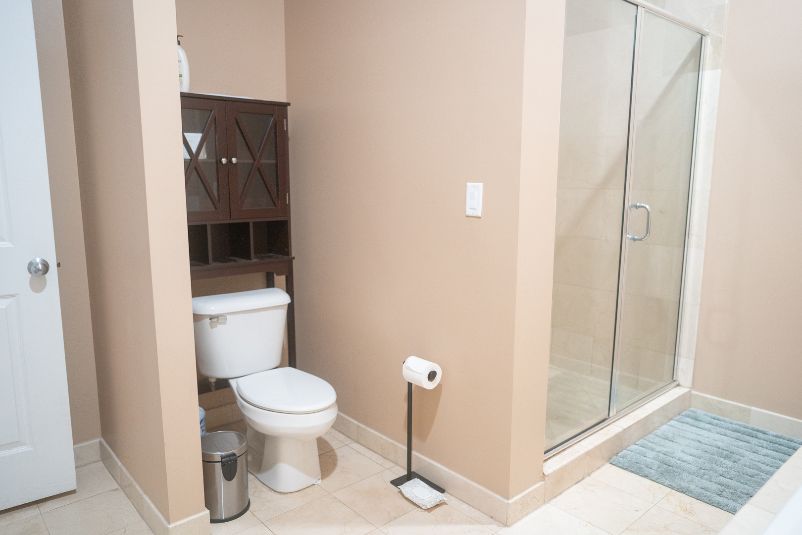 6421 West Touhy Avenue, Unit 4B Chicago, IL 60646 - Photo 12 of 24 a white toilet sitting next to a bathroom sink