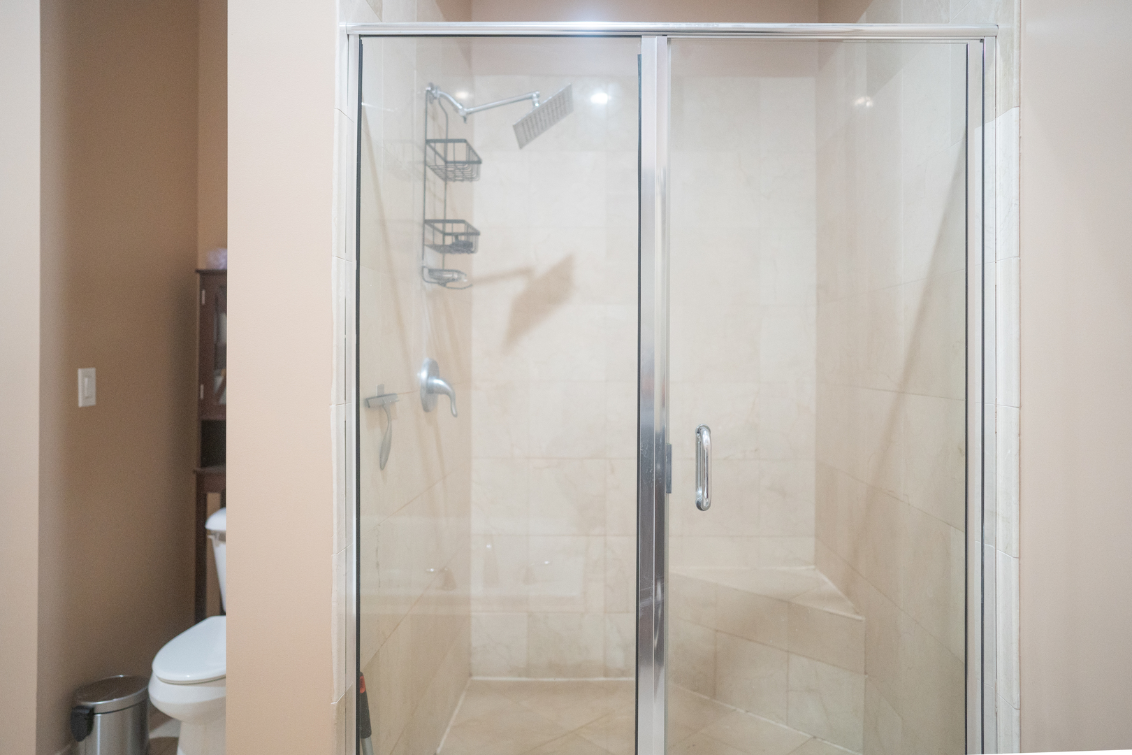 6421 West Touhy Avenue, Unit 4B Chicago, IL 60646 - Photo 13 of 24 a bathroom with a shower and a toilet