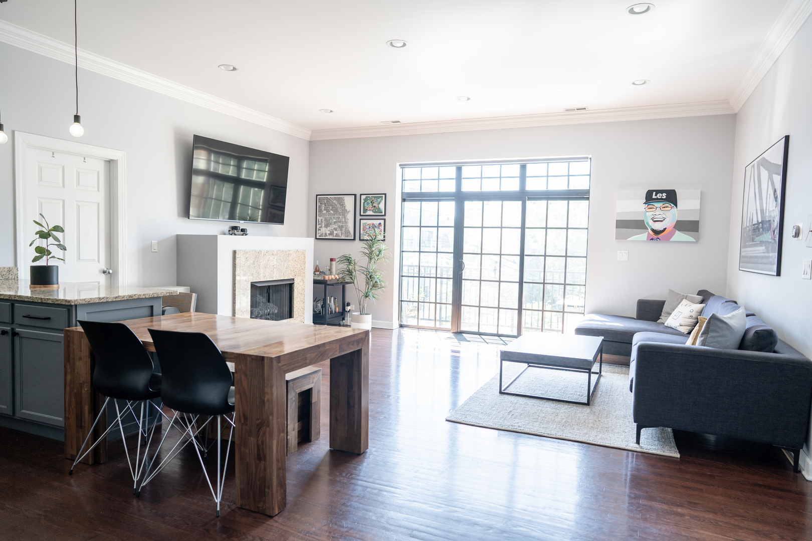 6421 West Touhy Avenue, Unit 4B Chicago, IL 60646 - Photo 2 of 24 a living room with furniture and a large window