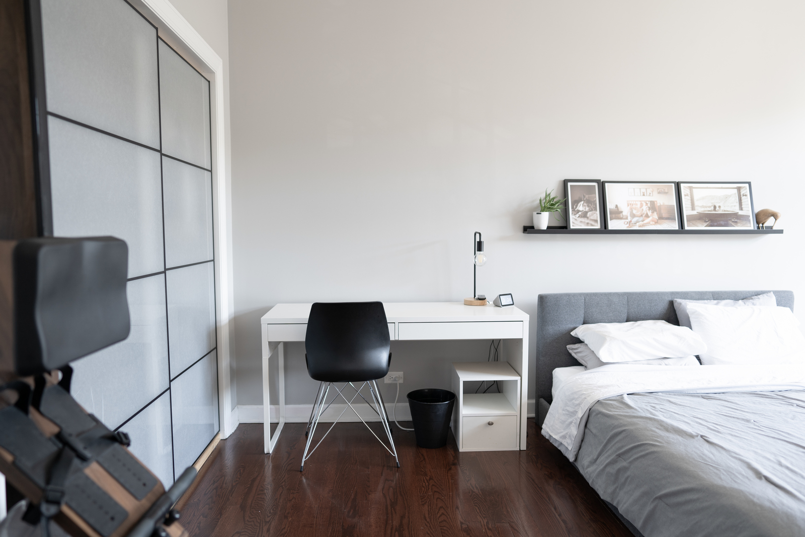 6421 West Touhy Avenue, Unit 4B Chicago, IL 60646 - Photo 9 of 24 a bedroom with a bed and a chair