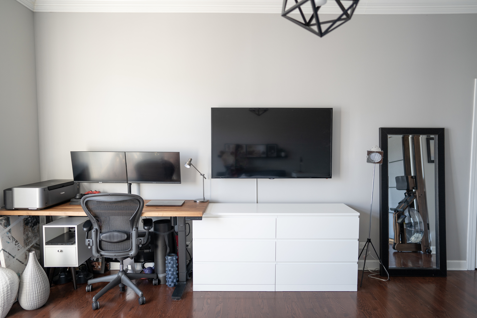 6421 West Touhy Avenue, Unit 4B Chicago, IL 60646 - Photo 10 of 24 a view of a livingroom with furniture and a flat screen tv