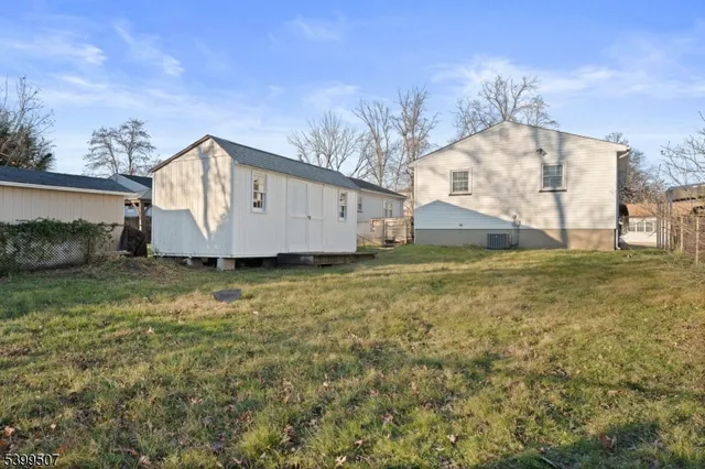 a house view with a garden space