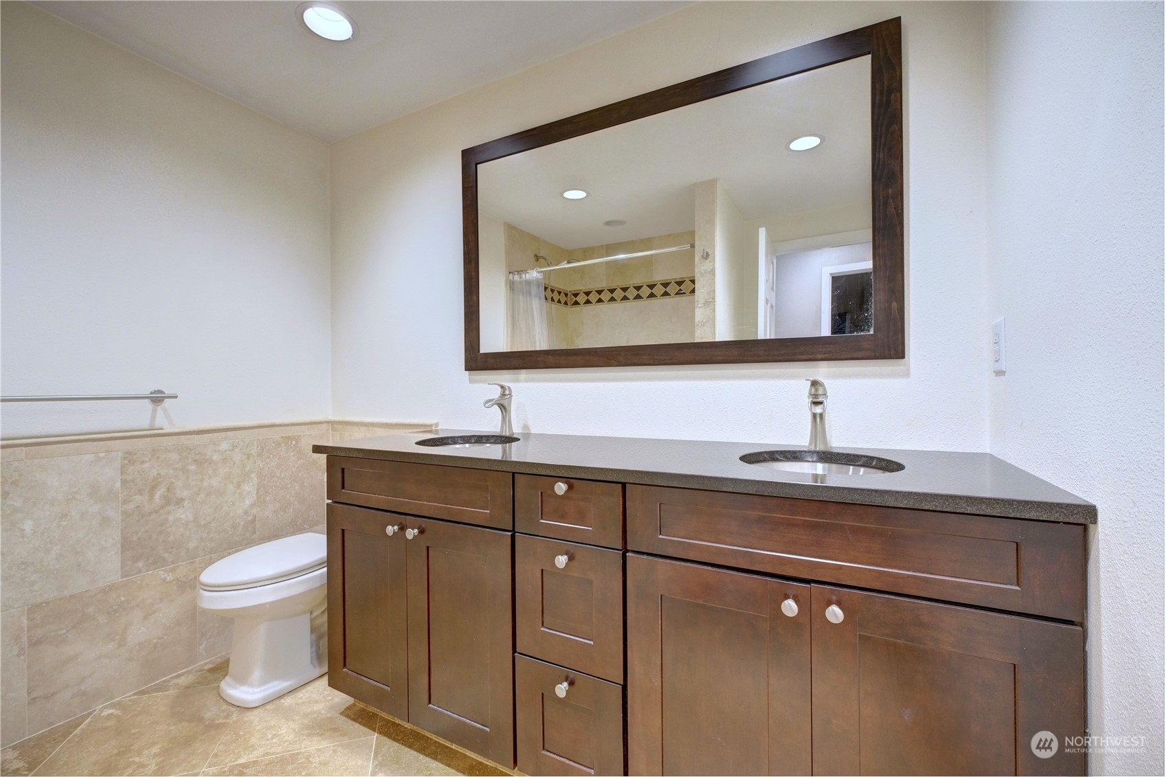 17802 Southeast Jones Road Renton, WA 98058 - Photo 16 of 38 a bathroom with a toilet sink and mirror