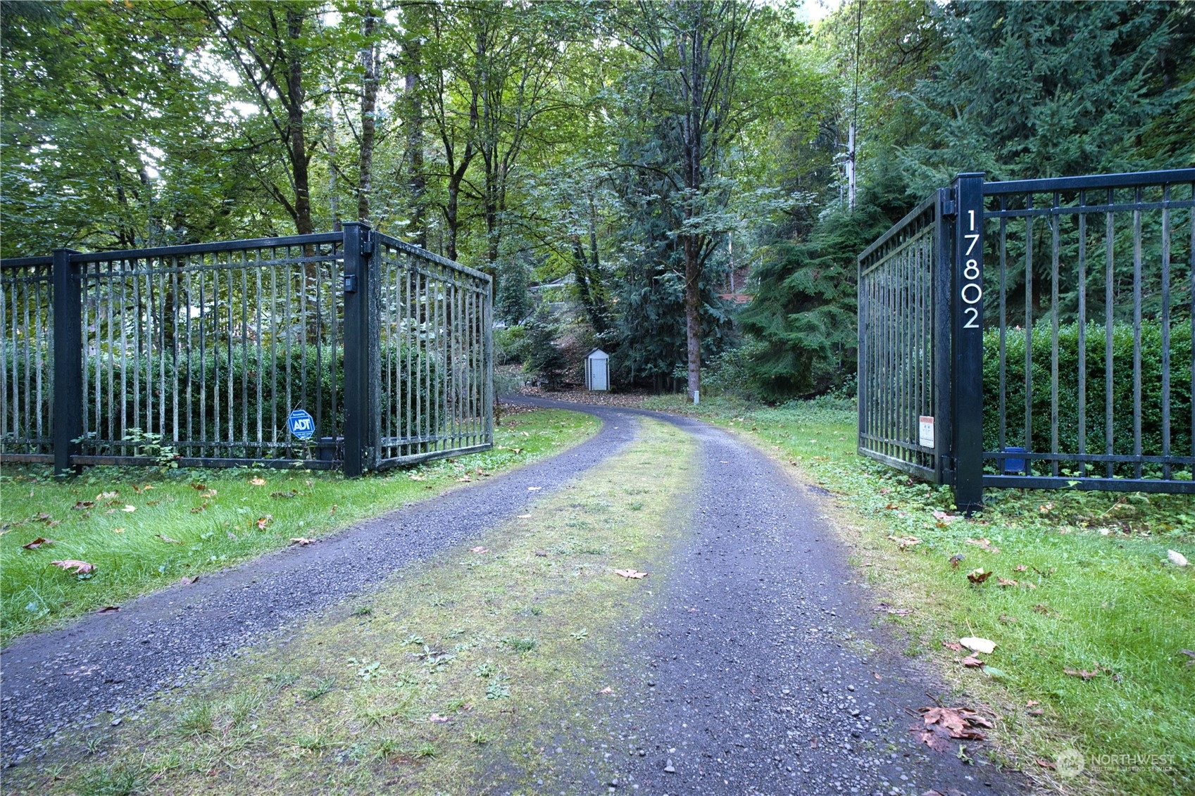 17802 Southeast Jones Road Renton, WA 98058 - Photo 2 of 38 a view of a pathway with a small garden