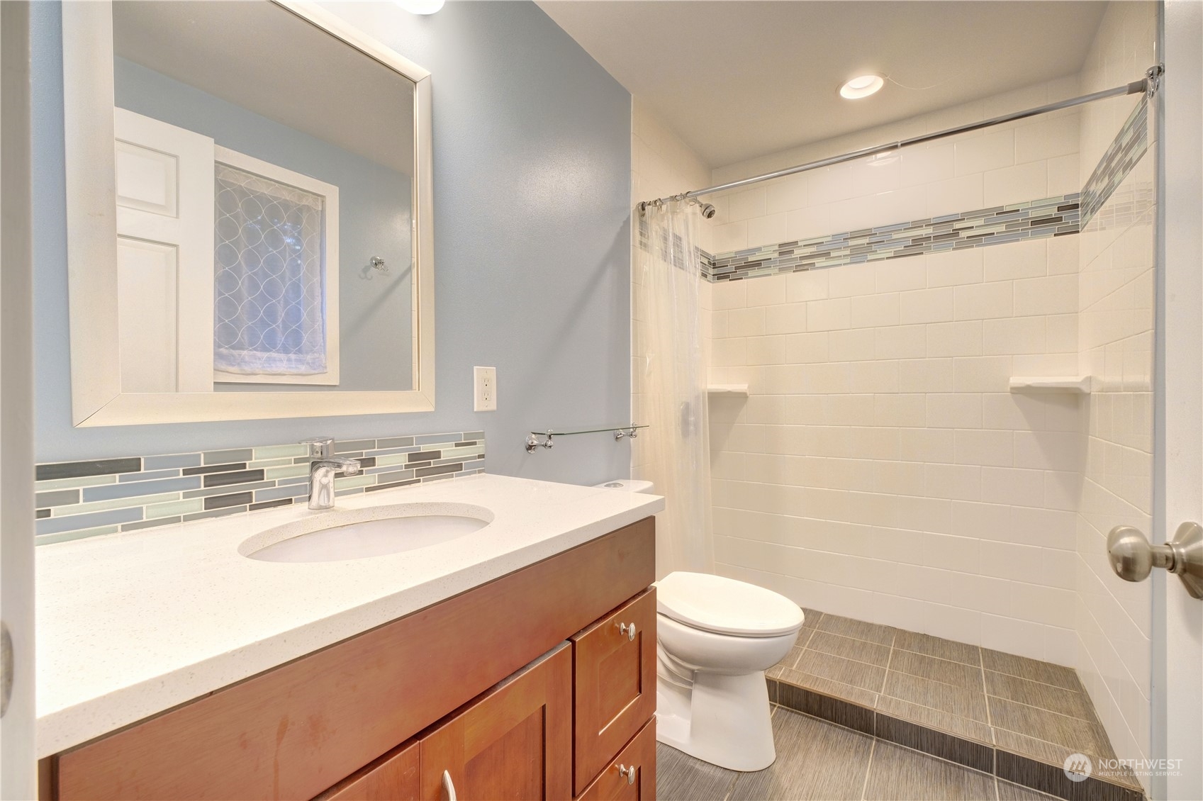 17802 Southeast Jones Road Renton, WA 98058 - Photo 21 of 38 a bathroom with a sink a toilet and shower