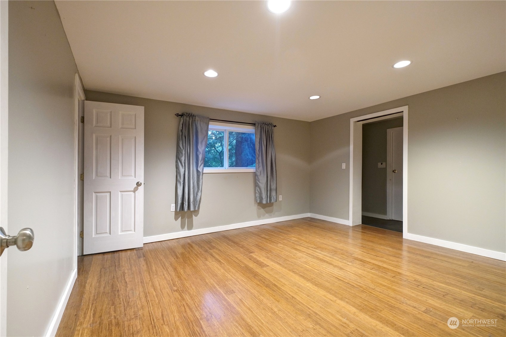 17802 Southeast Jones Road Renton, WA 98058 - Photo 22 of 38 wooden floor in an empty room with a window