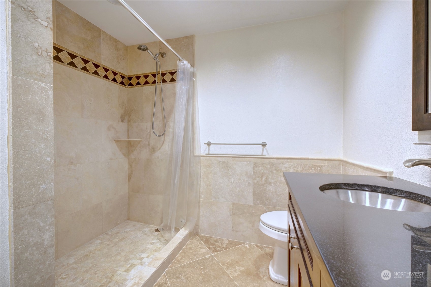 17802 Southeast Jones Road Renton, WA 98058 - Photo 23 of 38 a bathroom with a shower and a toilet
