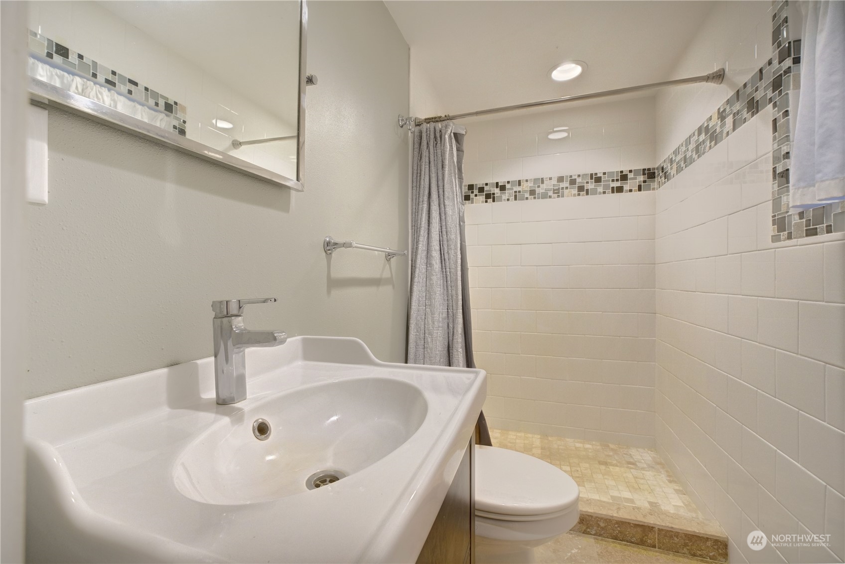 17802 Southeast Jones Road Renton, WA 98058 - Photo 25 of 38 a bathroom with a sink a toilet and shower
