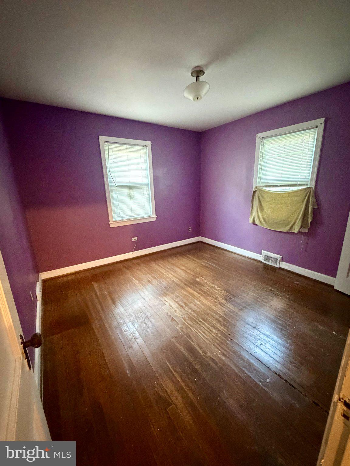 4606 Burlington Road Hyattsville, MD 20781 - Photo 3 of 10 Vibrant purple room with natural light.