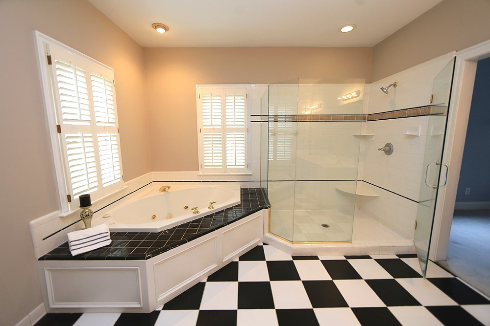 8617 Cold Springs Road Raleigh, NC 27615 - Photo 20 of 30 There is a large room with both generous tub and shower, dual sinks. Master Bath
