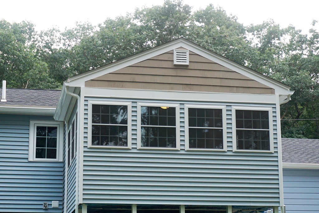 115 Harvard Road Littleton, MA 01460 - Photo 14 of 20 a view of a house with a yard