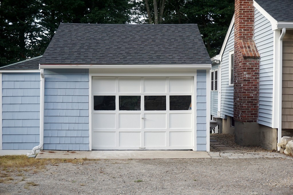 115 Harvard Road Littleton, MA 01460 - Photo 19 of 20 a view of a house with a door and garage