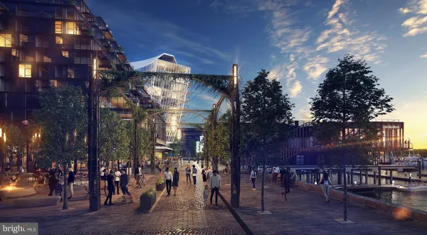 a front view of a building with sitting area