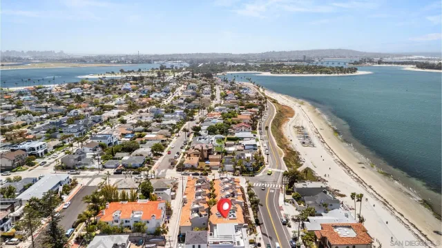 an aerial view of city and lake