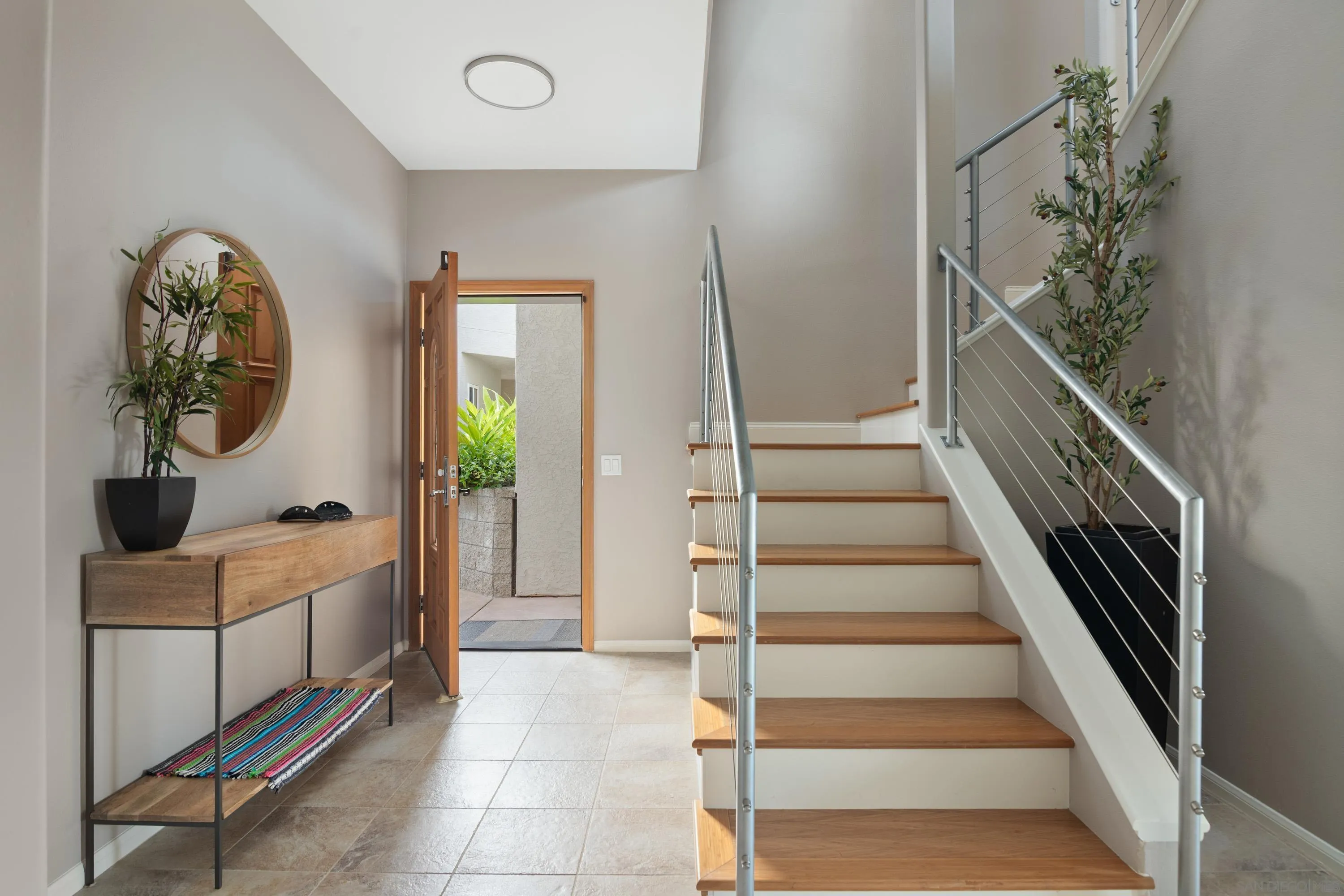 3701 Riviera Drive, Unit 11 Pacific Beach, CA 92109 - Photo 6 of 32 a view of entryway and bedroom