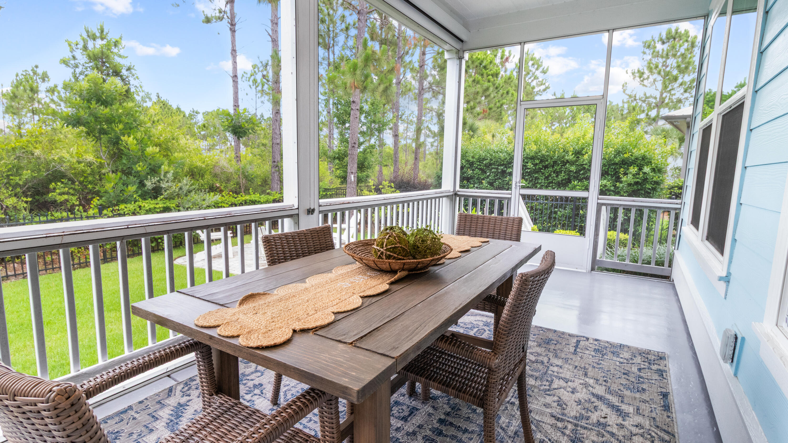 61 Sweet Breeze Drive Santa Rosa Beach, FL 32459 - Photo 32 of 92 a view of a balcony with table and chairs